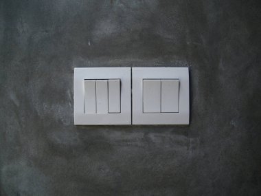 Modern elektrik ışık geçiş bir ışık gri duvar kağıdı arka plan.