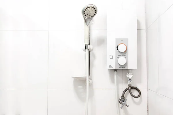 Water heater and shower in bathroom — Stockfoto