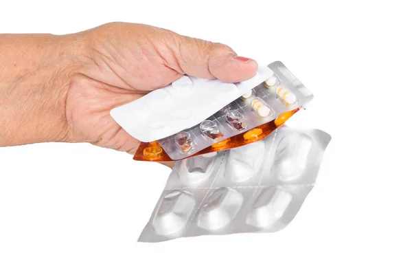 Starší žena holdind stack pilulek. Zdravotní péče koncept — Stock fotografie