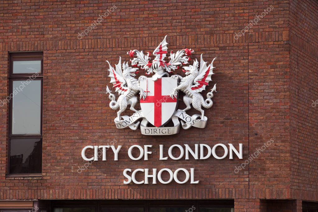 LONDON, UK - JUL 1, 2015: City of London school sign on a red brick wall in London. CLS is a day school for boys.