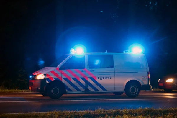 Holandská policie Auto světlo bliká — Stock fotografie