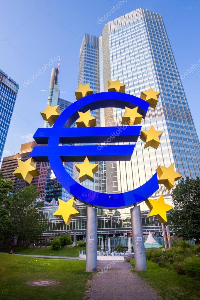FRANKFURT, GERMANY - JUL 11, 2013: Euro sign outside the European Central Bank. The ECB is building new premises in Frankfurt, due for completion in 2013.