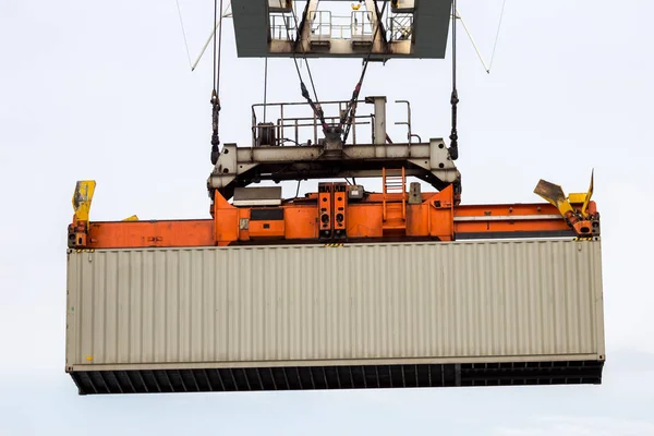 Sea container lifted by a harbor crane — Stock Photo, Image