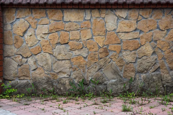 Stone wall texture in the courtyard — Stock Photo, Image