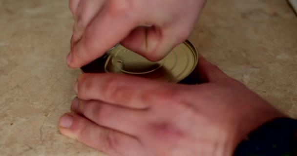 Can opened with sardine fish in oil close-up of fingers and metal opener — Stock Footage Can opened with sardine fish in oil close-up of fingers and metal opener Video Clip