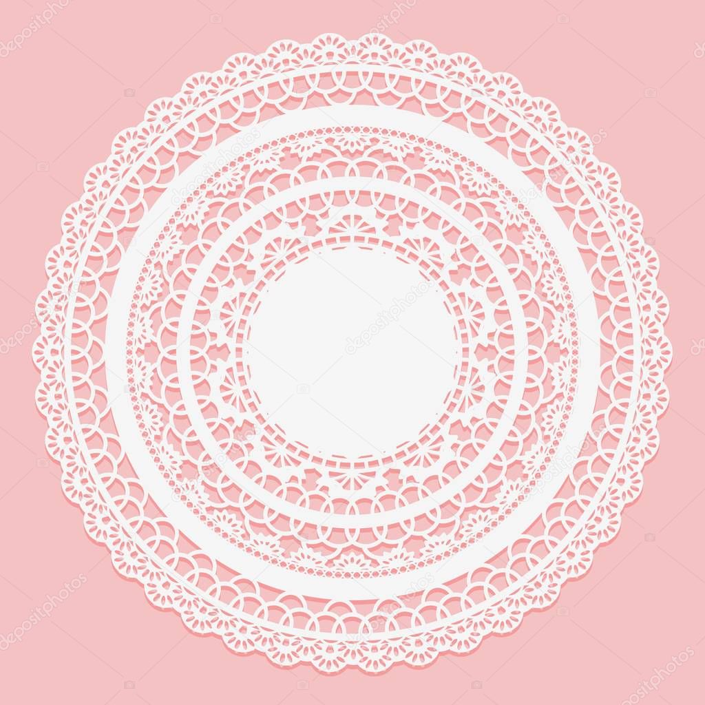 White lace napkin on a pink background. Openwork round frame.