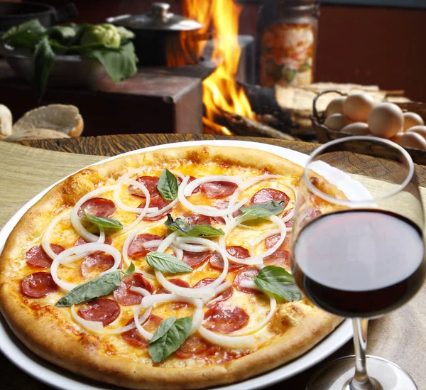 Pizza with glass of wine — Stock Photo, Image
