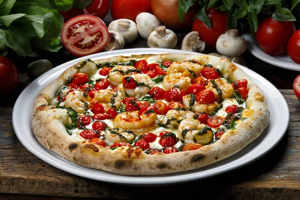Seafood pizza with cherry tomatoes — Stock Photo, Image