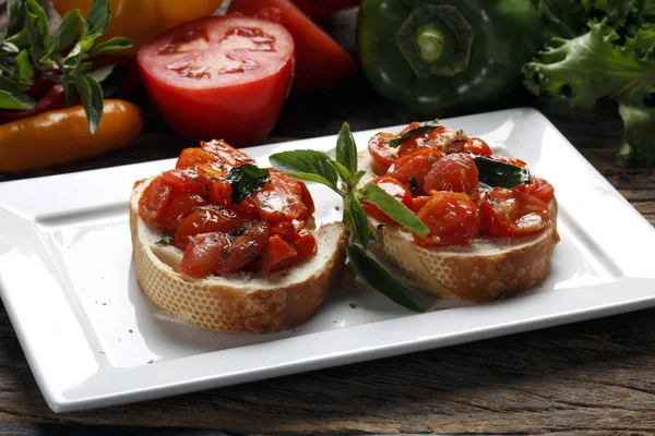 Canape with tomatoes and cheese — Stock Photo, Image