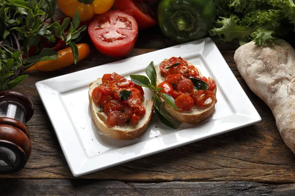 Canape with tomatoes and cheese — Stock Photo, Image