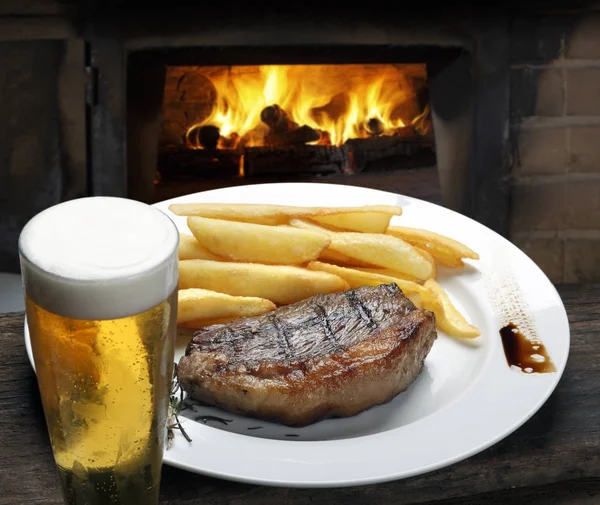 Steak with fries Stock Picture