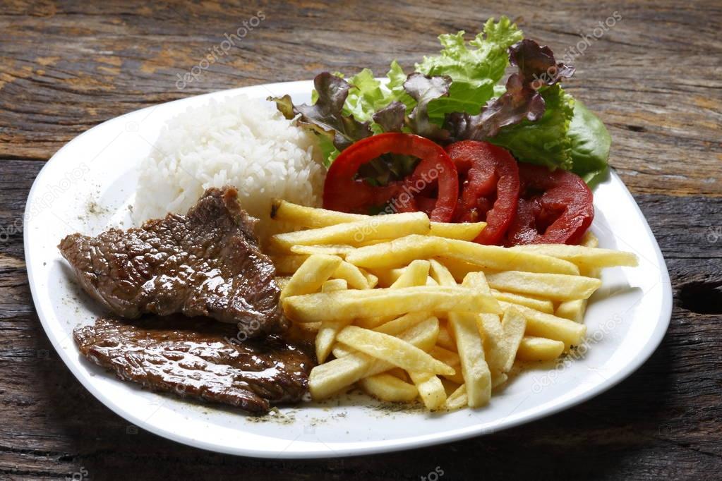 Fillet of picanha with garnishes