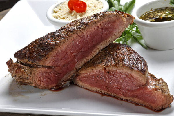 Medium rare sliced beef steak