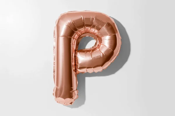Letter P, Rose gold foil balloon alphabet isolated on a white background with Clipping Path