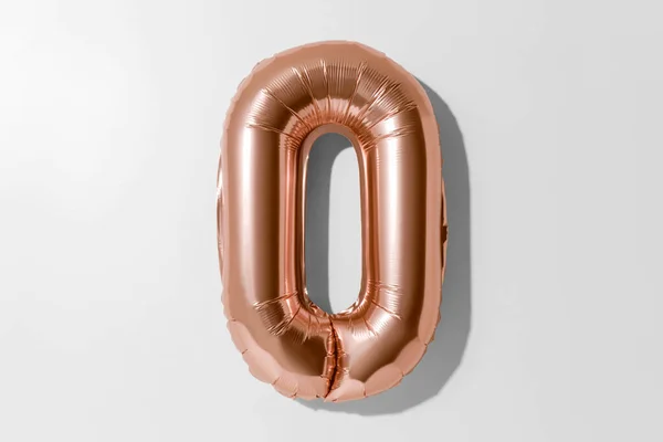 Number 0, Rose gold foil balloon number zero isolated on a white background with Clipping Path