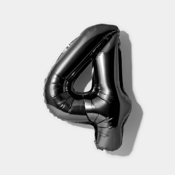 Number 4, Black foil balloon number four isolated on a white background with Clipping Path