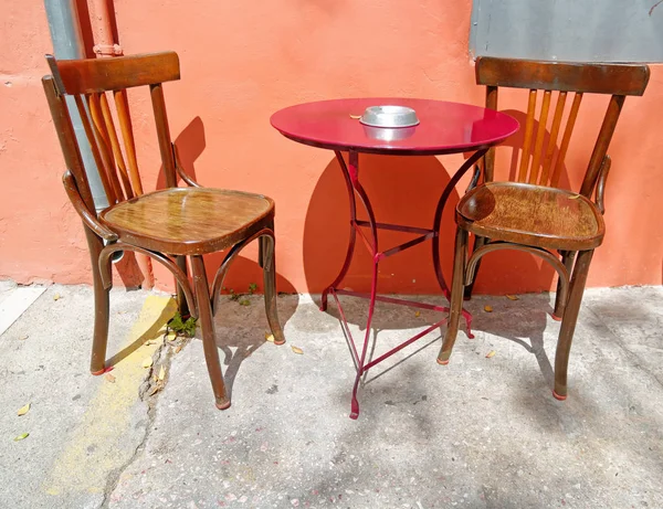 Coffee table and wooden chairs — Stock Photo, Image