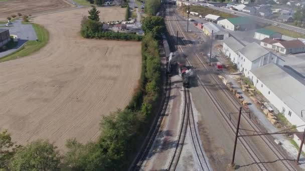 Aerial View Multiple Antique Restored Steam Engines Train Yard Steaming — 비디오