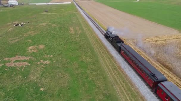 Aerial Angled View Restored Steam Engine Approaching Blowing Steam Smoke — Stock Video