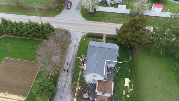 Aerial View Amish Men Replacing Roof Old Farm House Using — Stock Video