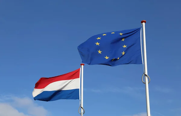 Bandeira holandesa e da união europeia — Fotografia de Stock