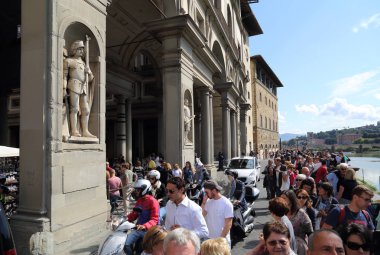 Tourists at the Uffizi gallery in Florence, Itatly clipart