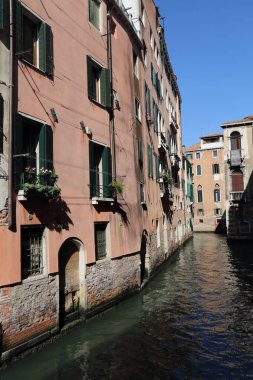 Historical houses along a canal in Venice, Italy