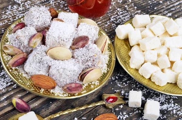 Turkish delight with coconut and tea — Stock Photo, Image