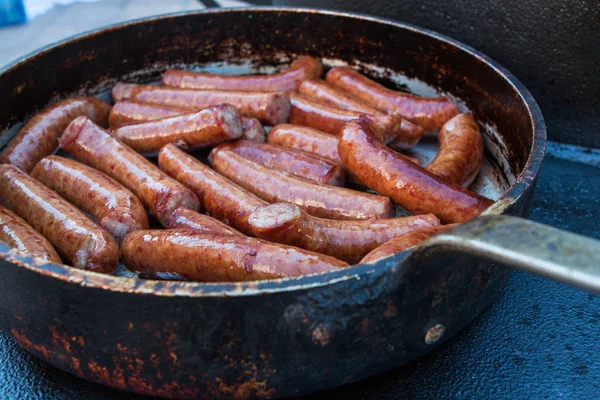 Several Sausages Cook In Vintage Frying Pan — Stock Photo, Image