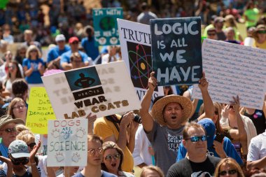 Marchers Display Signs At Rally Before Atlanta March For Science clipart