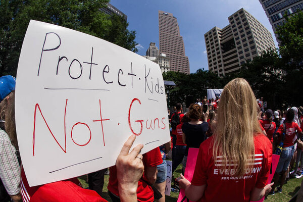 Woman Holds Up Anti Gun Sign At Atlanta Political Rally