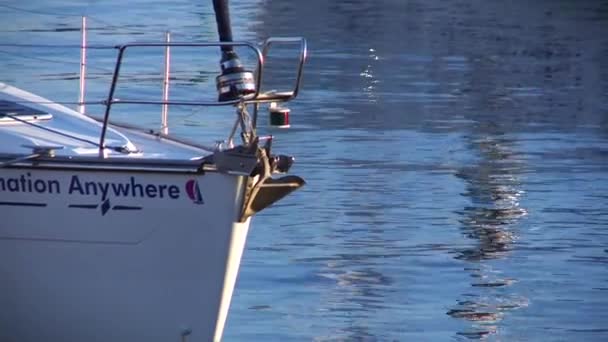 Bow of a yacht in a harbour at dusk — Stock Video