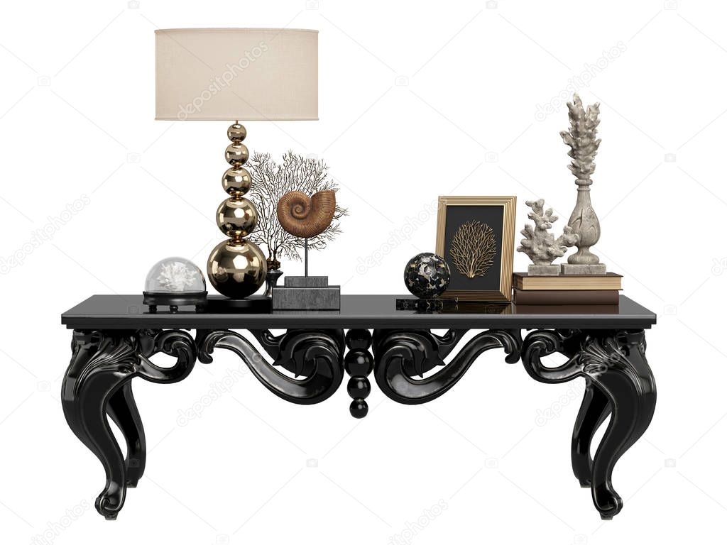 Classic carved table with decor:lamp,coral,frames,books isolated