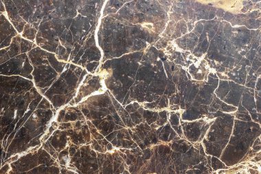 Kahverengi mermer yüzey. Üst Manzara. Doğal doku arkaplanı.