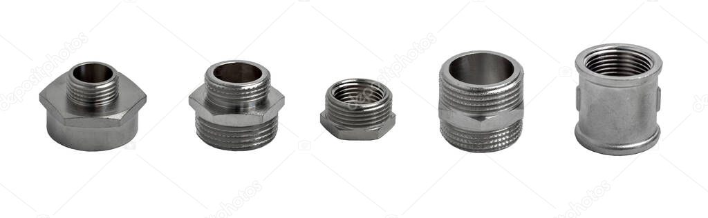 Set of metal connectors: reducers, nipple and coupling isolated on white background. Pipe fittings.