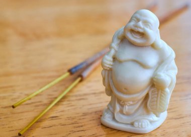 The value of the figure of the God of wealth hotea. Hotei is the God of wealth, happiness and fun in Feng Shui. The laughing Buddha, Hotei, the Buddha of abundance  and that not all of his nicknames. clipart