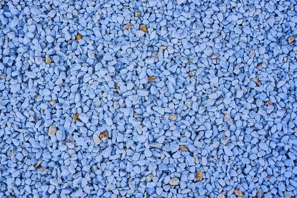 Evin iz bırakmamak için hafif ezilmiş çakıl.