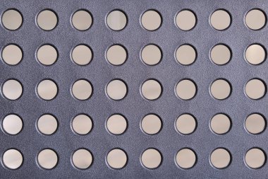 Nokta dokusu arka planı. Renkli arka planda eski tarz siyah delikli yüzey. Soyut gölge. Sanat klasiği.