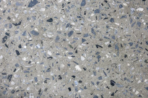 Серый мрамор, мелкие гравийные камни, текстурный фон. Абстрактный фон . — стоковое фото