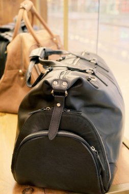 Road leather bag. Luxury travel. Casual style, beauty accessories. Beauty model. Retro style.
