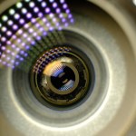 La carte d'affaires des photographes Objectif de l'appareil photo en arrière-plan pour la conception conceptuelle. Fond sombre. Concept technologique. Concept d'entreprise .