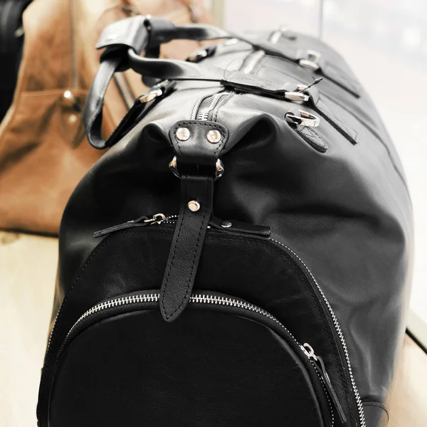 Road leather bag. Luxury travel. Casual style, beauty accessories. Beauty model. Retro style.