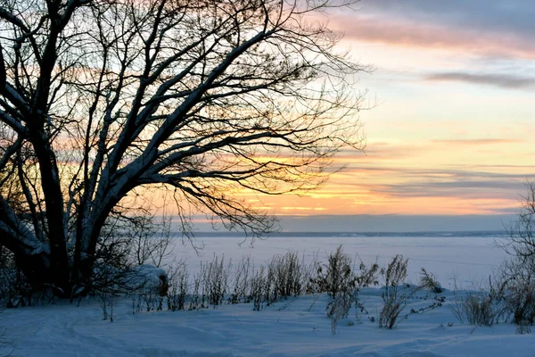 winter sunset on a frozen river