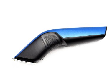 Beyaz arka planda saç kesicisi.