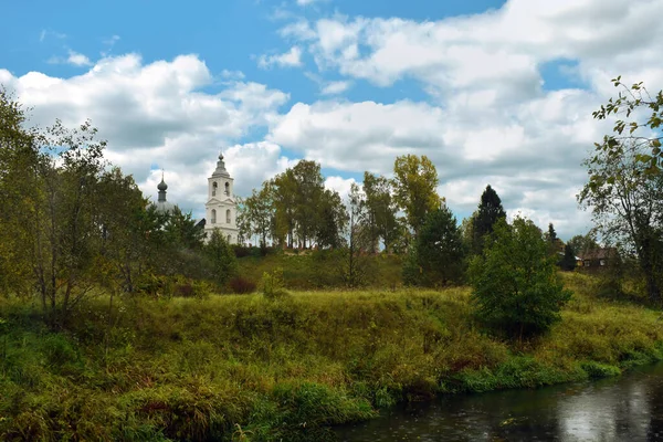 Christian church on the banks of a small river