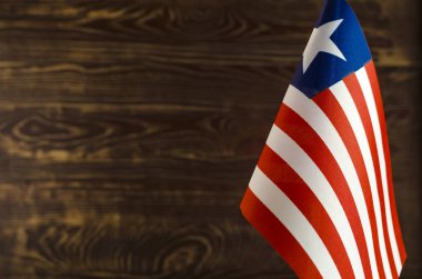 Yazı bulanık arkaplan için ön planda Liberya Cumhuriyeti bayrağının bir parçası