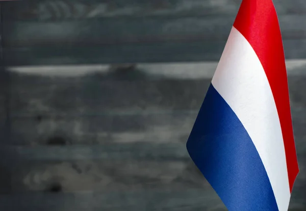 Fragmento Bandera Los Países Bajos Primer Plano Fondo Madera Borrosa —  Fotos de Stock