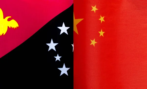Fragmenten Van Nationale Vlaggen Van Papoea Nieuw Guinea China Close — Stockfoto