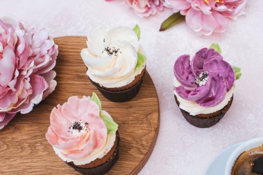 wedding cupcakes on a pink background