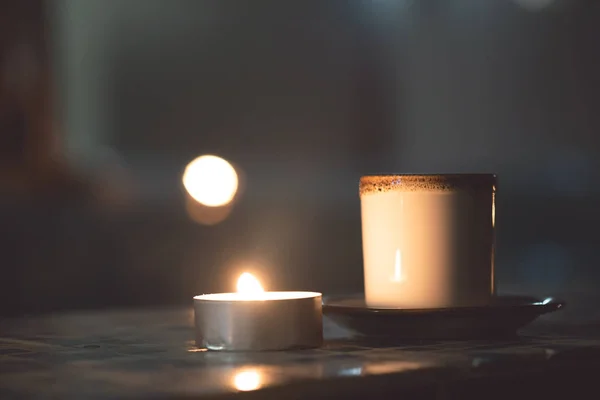 Cup Hot Tea Burning Candle Dark Background Close — Stok fotoğraf
